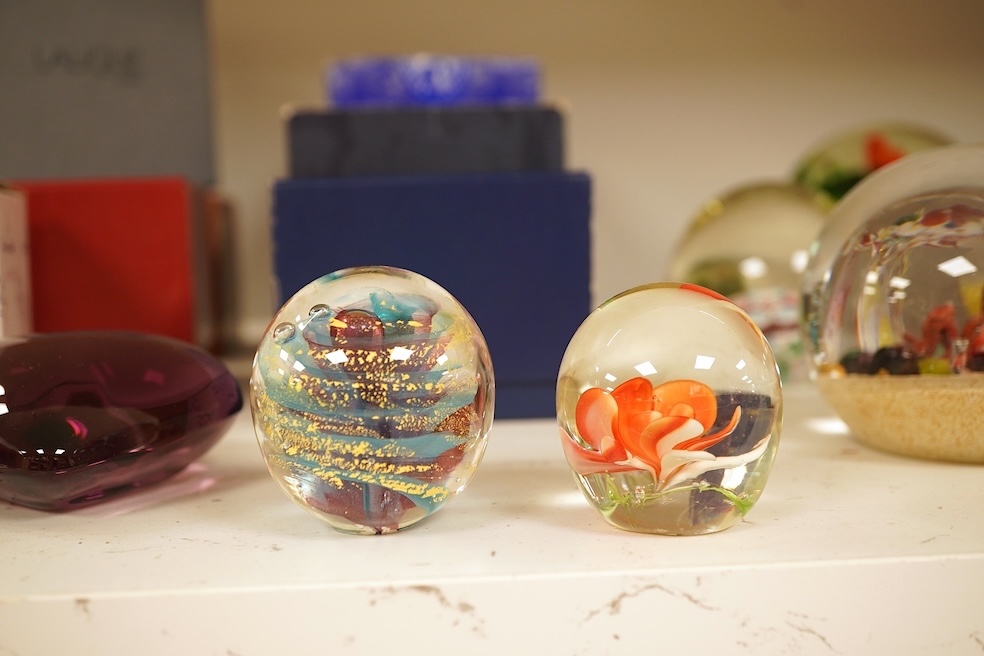 Seventeen various paperweights, including Lalique and a signed Murano example, some boxed, largest 10cm high